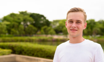 Portrait of young teenage boy at the park